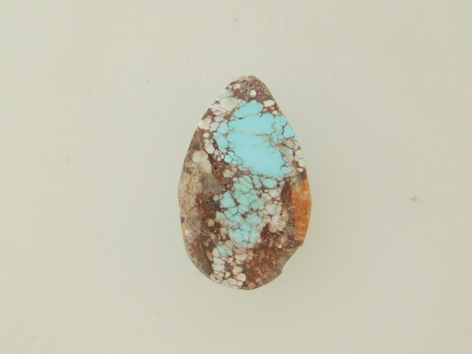 MEDIUM BLUE BISBEE TURQUOISE with light host 15.5 carats Reverse View