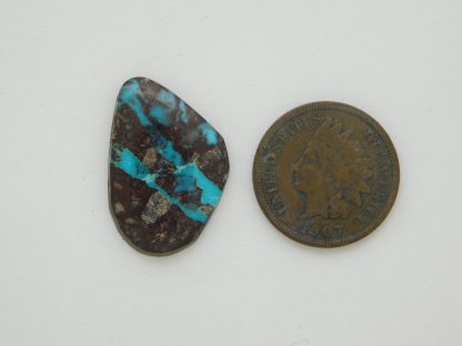 BISBEE TURQUOISE Streaks in lavender host rock cabochon 10 carats